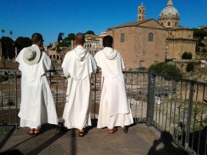 Friars watching the Roman Forum in Rome