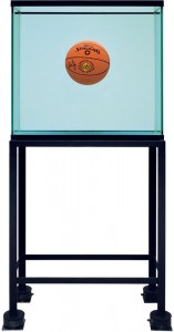 Jeff Koons, One Ball Total Equilibrium Tank (Spalding Dr. J 241 Series), 1985. Glass, steel, sodium chloride reagent, distilled water, and basketball; 64 3/4 × 30 3/4 × 13 1/4 in. (164.5 × 78.1 × 33.7 cm). B.Z. and Michael Schwartz. ©Jeff Koons. Image via whitney.org 