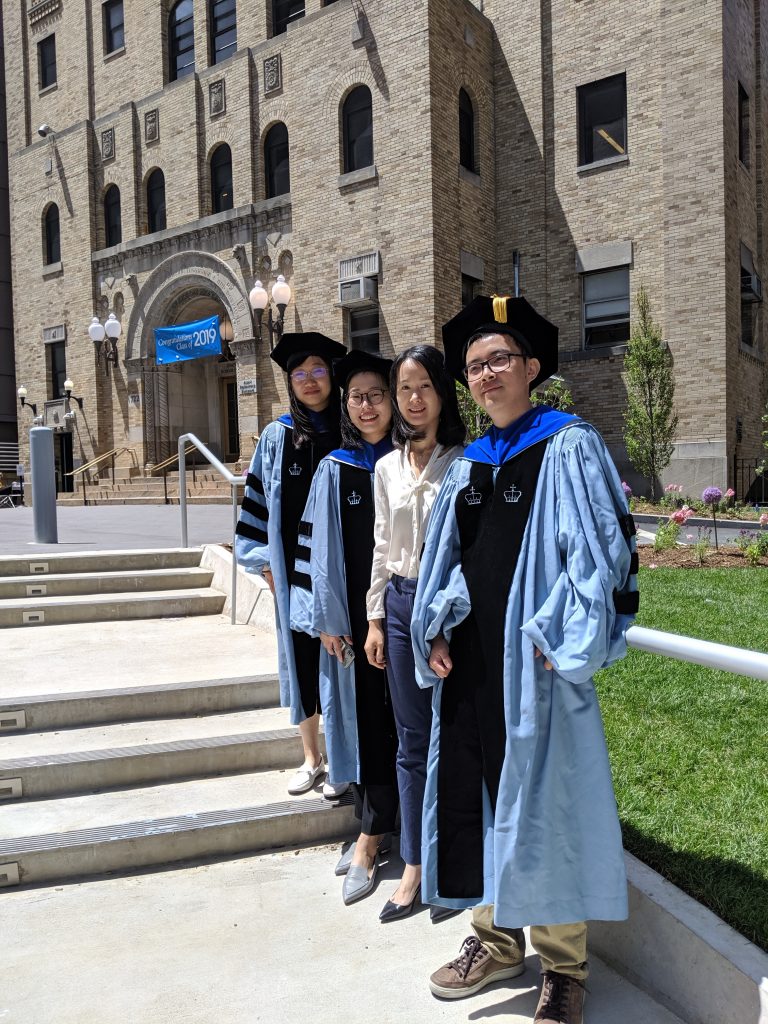 Class of 2019 graduates with Professor Wang